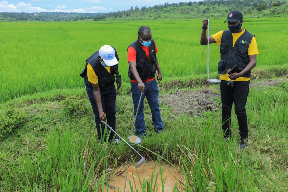 Rwanda Biomedical Centre health experts conduct mosquito research during an outreach program in Bugesera District. Photo by Craish Bahizi