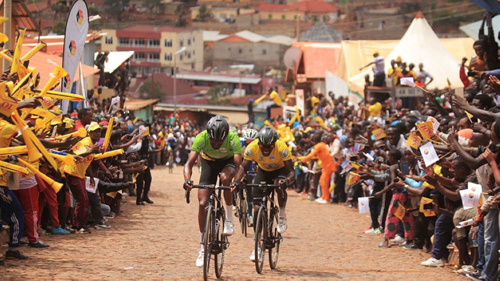 Tour du Rwanda 2017 Joseph Areruya and Eritrian Eyob  Metkel climb  the Mur de Kigali, the legendary cobblestone climb — one of the toughest challenges awaiting global cycling stars. Photo by Sam Ngendahimana