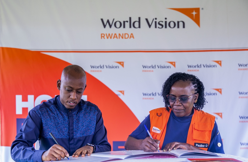 Ange Sebutege, Mayor of Huye District and Pauline Okumu, the National Director for World Vision Rwanda during the handover of Maraba Area Project on Tuesday, September 16. All photos by Craish Bahizi