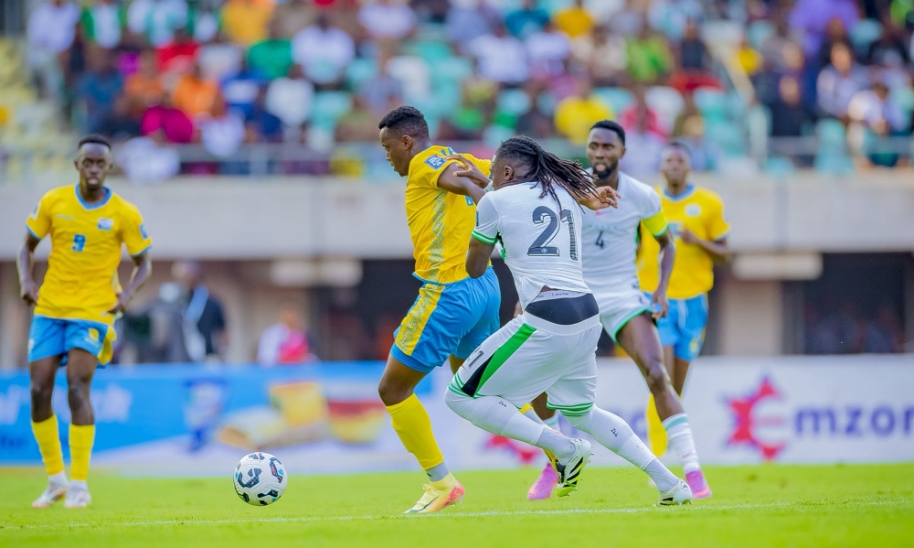 National team striker Innocent Nshuti wins the balls against Nigerians midfielder during the game. The Super Eagles defeated Rwanda 1-0 on Saturday, boosting their World Cup qualifying hopes