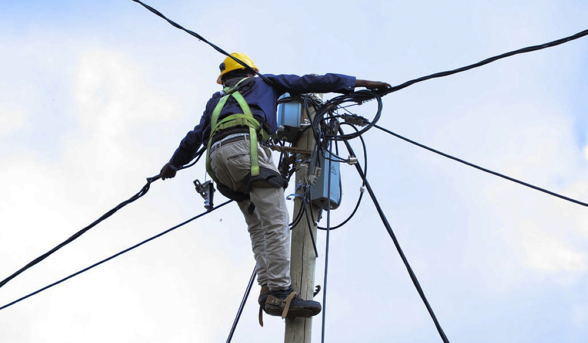 An electrician during electricity supply exercise in Gicumbi. Min Sebahizi has assured that the newly introduced electricity tariffs will not lead to an increase in commodity prices.
