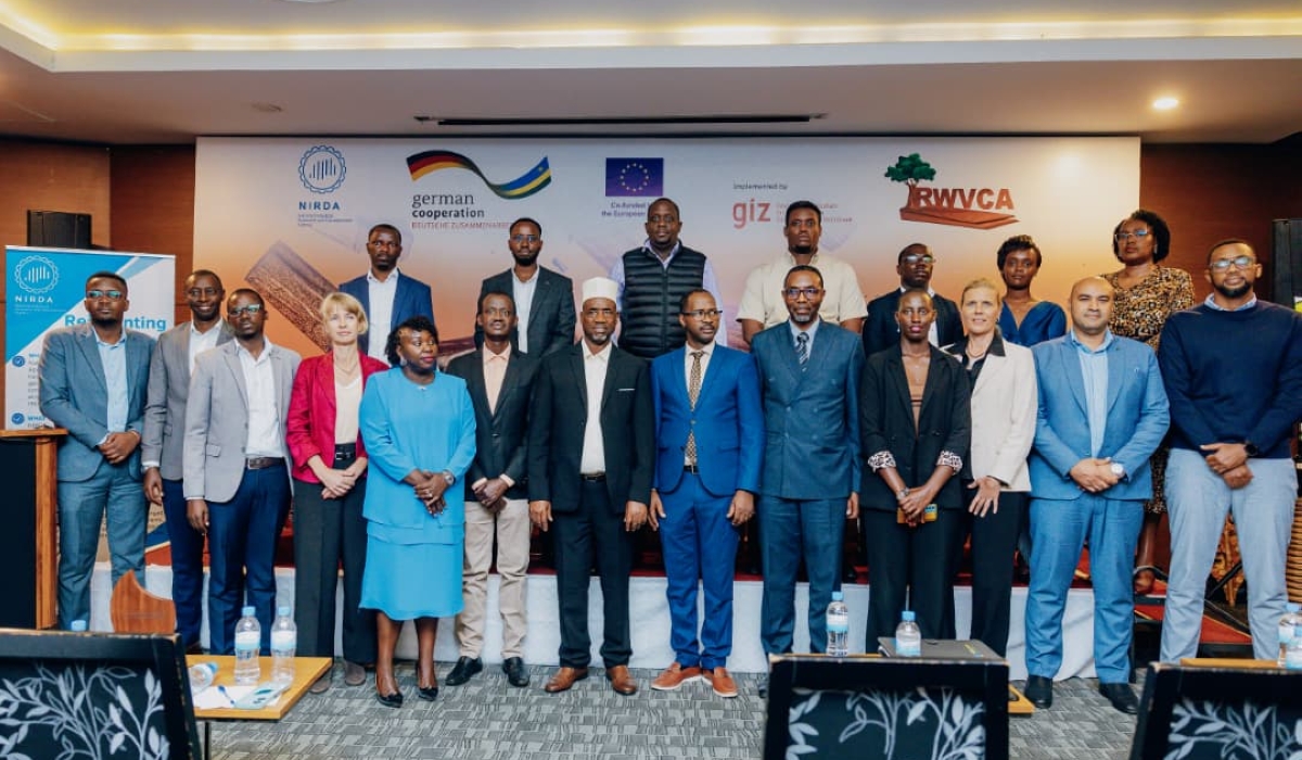Officials and participants pose for a photo at the inaugural Rwanda Wood Sector Forum (RWSF) on September 17. Photos by Craish BAHIZI