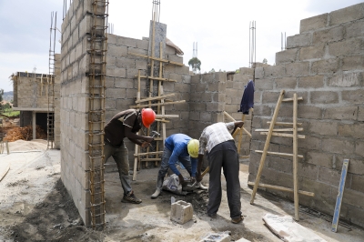Workers at a construction site in Kigarama Sector in Kicukiro. Craish Bahizi