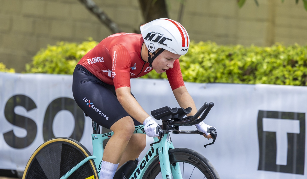 A rider climbs Cote de Kimihurura a cobbled street in Kigali during U23 ITT race on Monday. Photo by Dan Gatsinzi