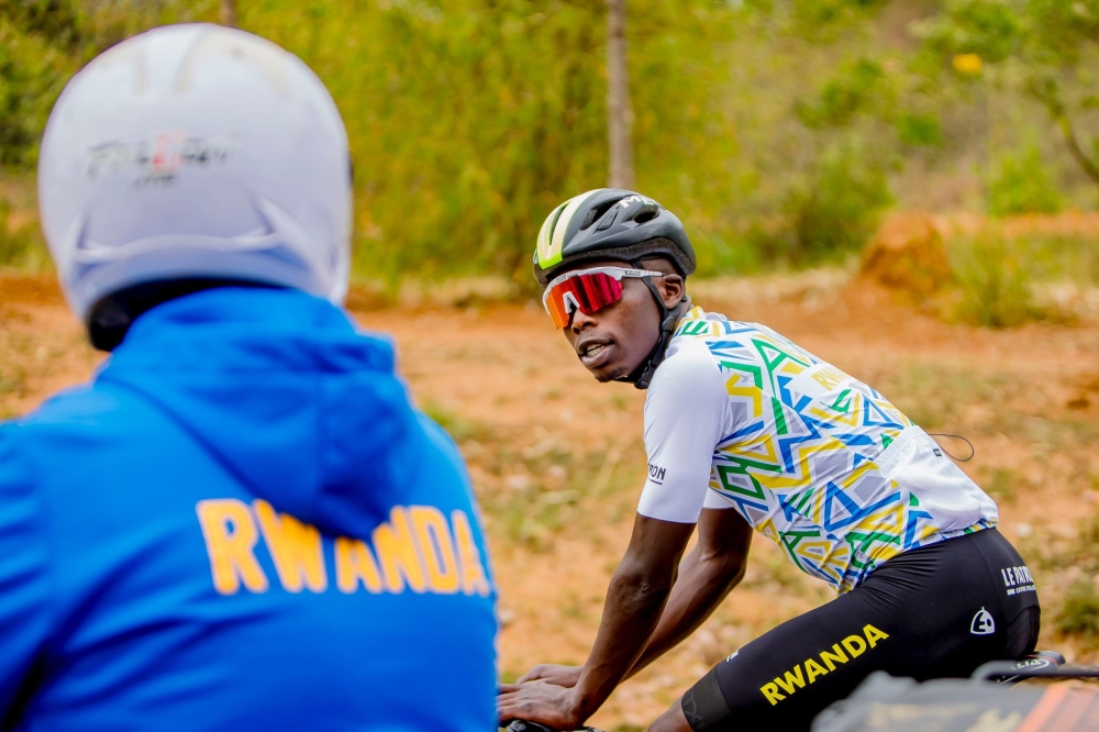 Moise Mugisha (right) will be out of the elite race on Sunday.
