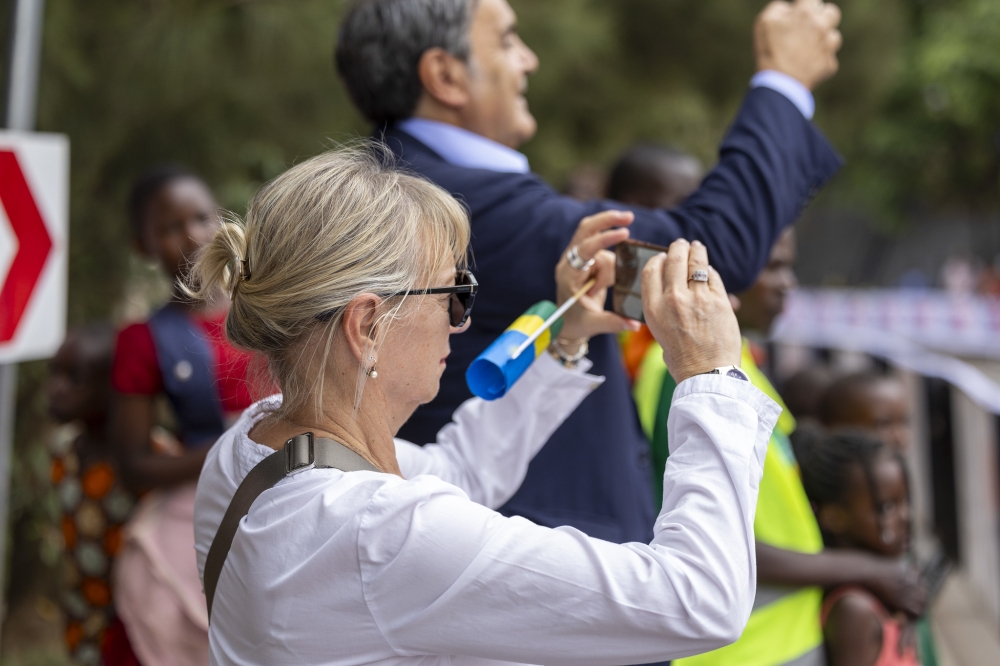 Some fans capture some video of the race.