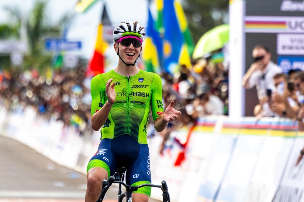Slovenian cyclist Tadej Pogačar celebrates his victory to be crowned UCI Road World Champion in Kigali on Sunday, September 28. Photo by Olivier Mugwiza.