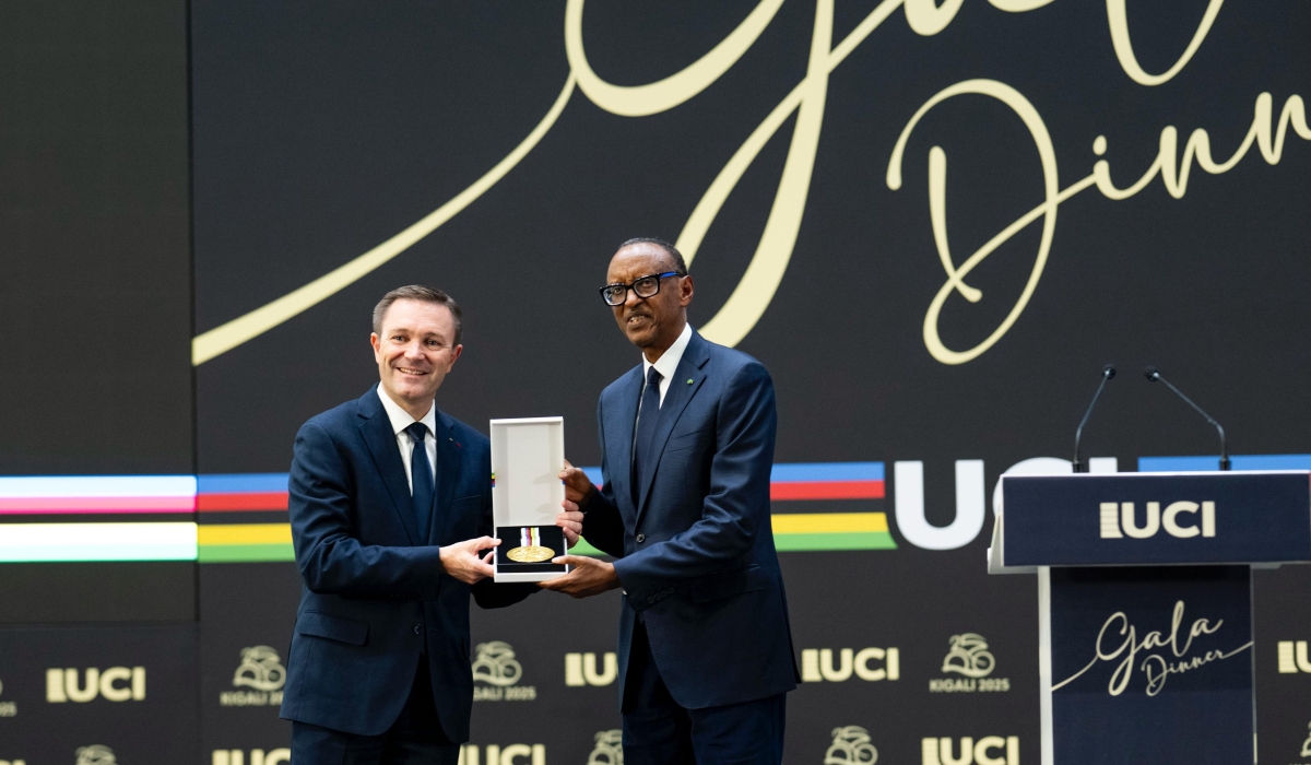 President Paul Kagame receives the UCI Order presented to him by UCI President David Lappartient, on Saturday, September 27, at Kigali Convention Centre.