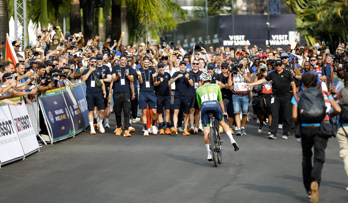 Slovenian cyclist Tadej Pogačar after crossing the finish line to win the 2025 UCI Road World Championships in Kigali. Dan Gatsinzi