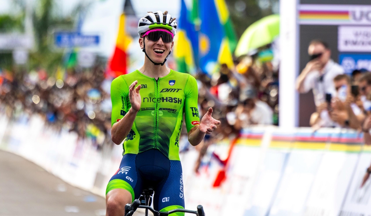 Slovenian cyclist Tadej Pogačar celebrates his victory to be crowned UCI Road World Champion in Kigali on Sunday, September 28. Photo by Olivier Mugwiza.