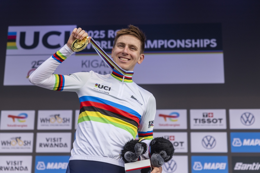 Slovenian cyclist Tadej Pogačar celebrates his victory to be crowned UCI Road World Champion in Kigali on Sunday, September 28. Photo by Olivier Mugwiza.