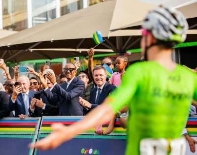 President Paul Kagame, UCI President David Lappartient, and Prince Albert II of Monaco cheer for champion Tadej Pogačar after he crossed the finish line on Sunday, September 28. Photo by Djasari Shumbusho