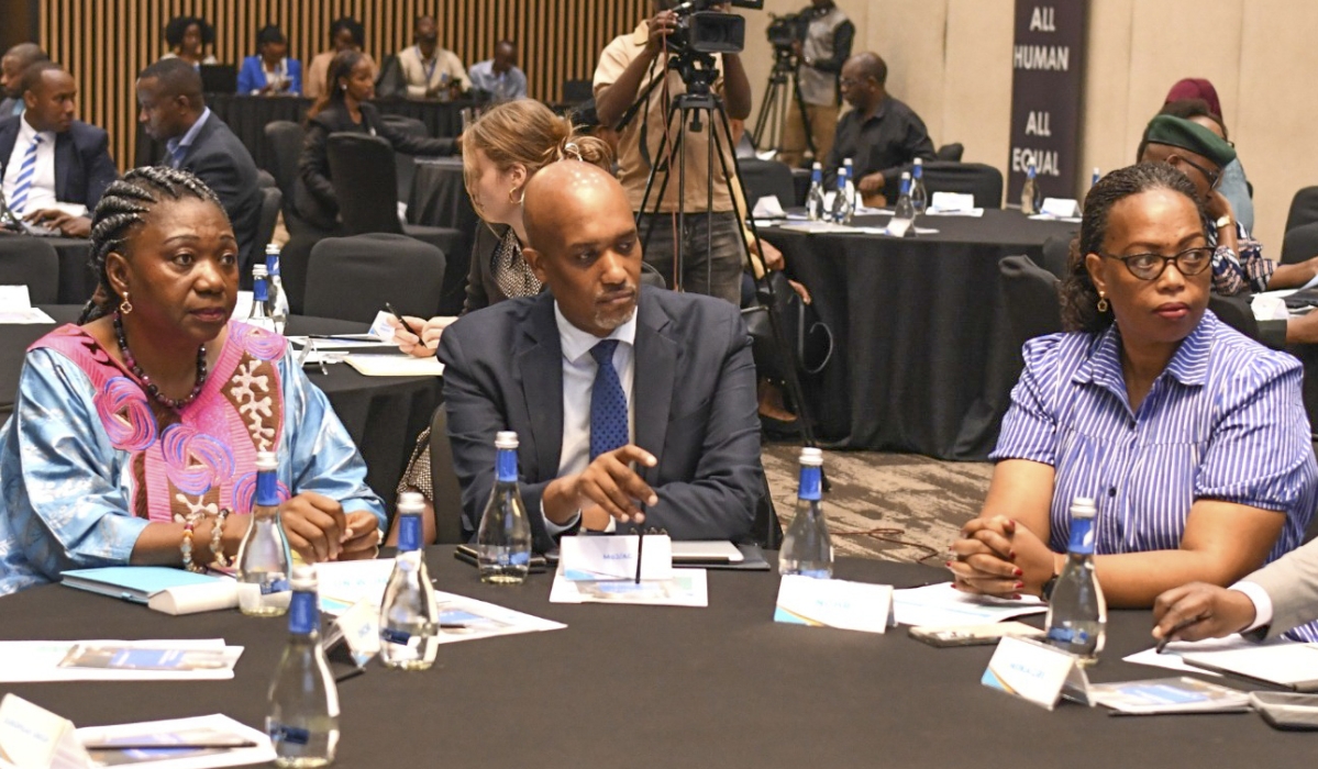 Minister of Justice Emmanuel Ugirashebuja and delegates follow a presentation at the National Stakeholders’ Validation Workshop, held on Tuesday, September 30. courtesy