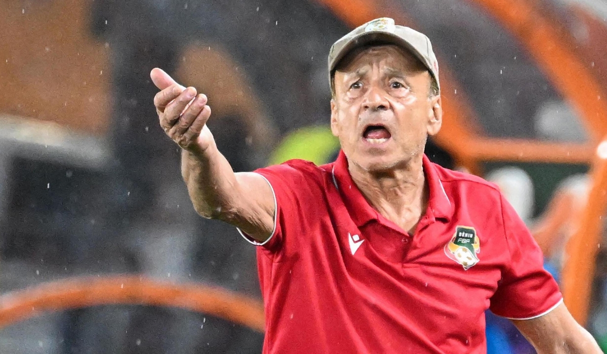 Benin head coach Gernot Rohr gives instructions during the match.