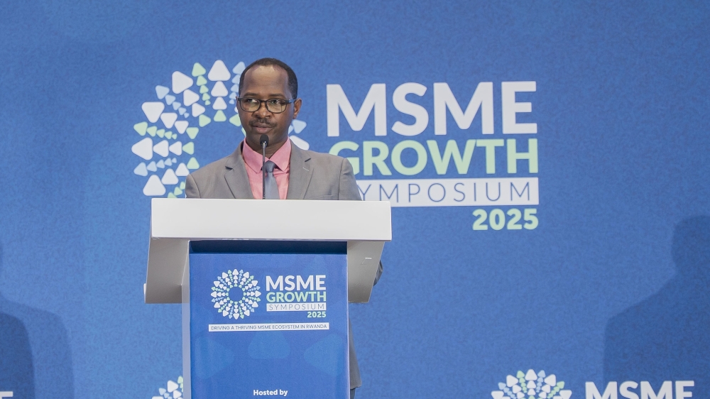 Alexis Kabayiza, Chief Technical Advisor for MINICOM speaks at the meeting Alexis Kabayiza, Chief Technical Advisor for MINICOM speaks at the meeting