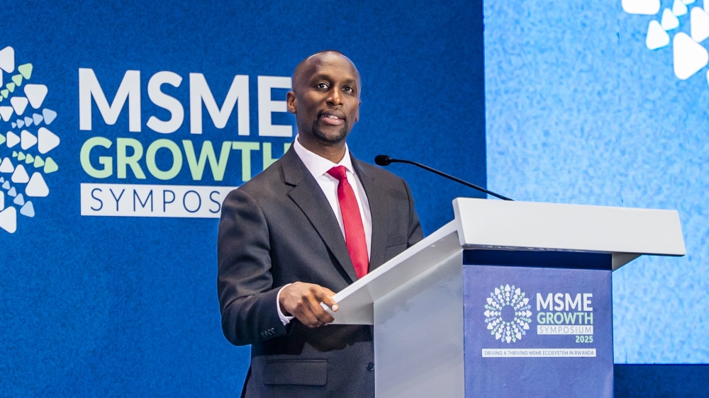 Ivan Ntwali, Country Director for Mastercard Foundation Rwanda speaks at the symposium Ivan Ntwali, Country Director for Mastercard Foundation Rwanda speaks at the symposium