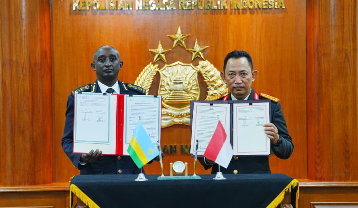 Namuhoranye and his Indonesian counterpart General Listyo Sigit Prabowo after the signing. Courtesy