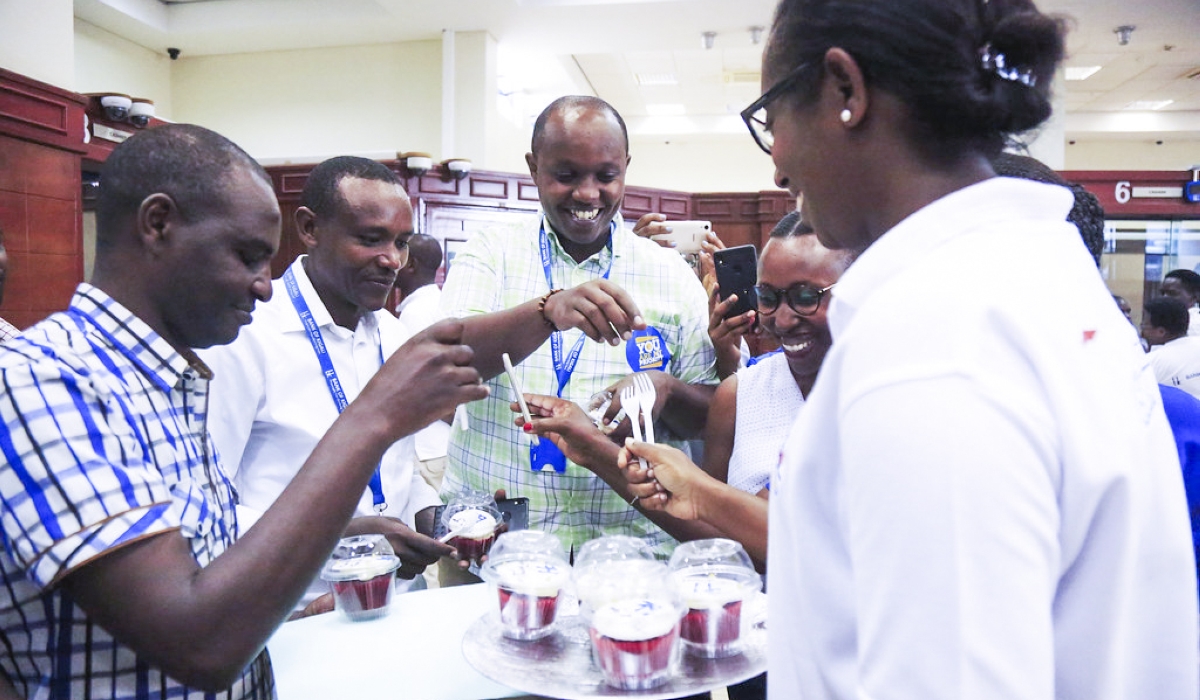 Bank of Kigali staff and customers during the celebaration of Customer Service Week. Sam Ngenda