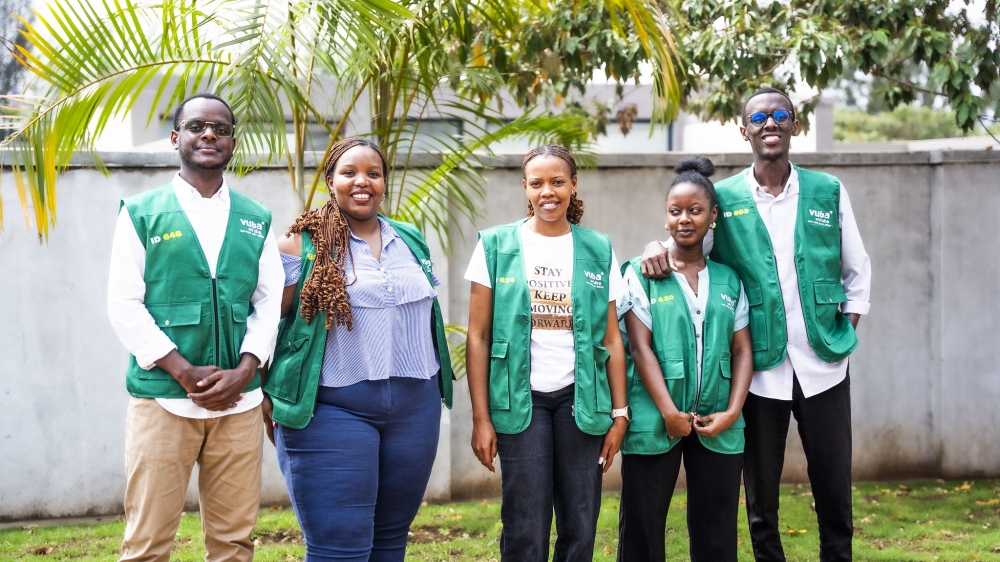 Vuba Vuba staff pose for a photo as the company celebrate the Customer Service Week. Photos by Kellya Keza