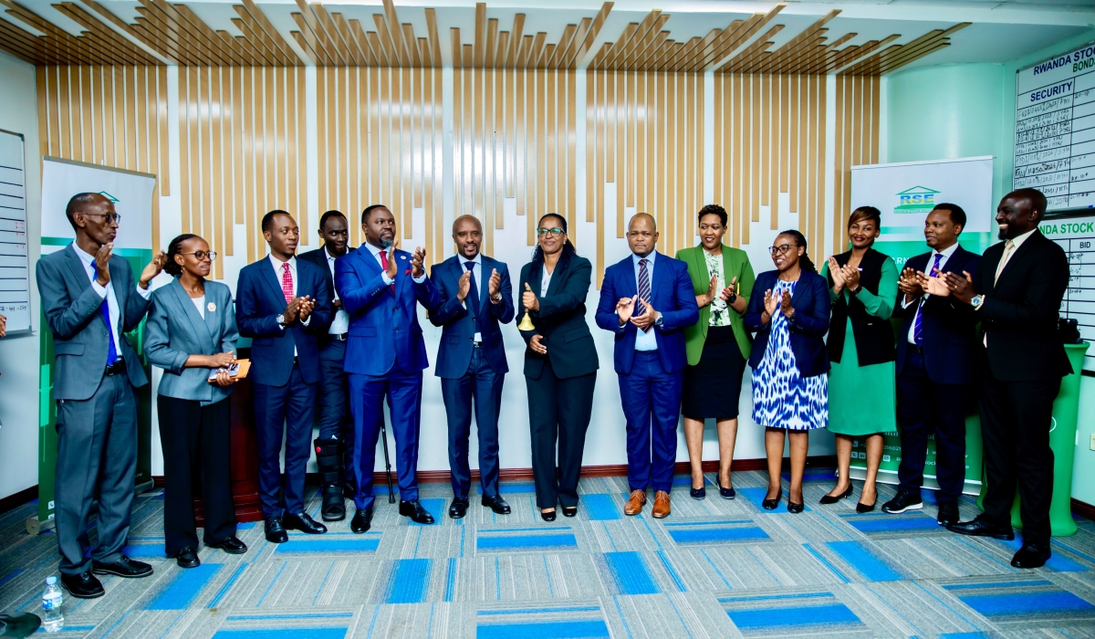 Officials poses for a photo as Mahwi Grain Millers listed its second tranche bond on the Rwanda Stock Exchange (RSE)  on October 8. Courtesy