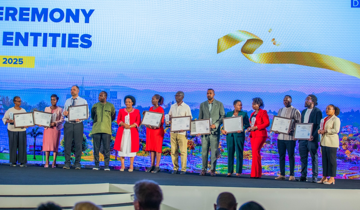 Representatives of the pioneering entities pose for a group photo at the event on Wednesday, October 8. All photos by Craish Bahizi