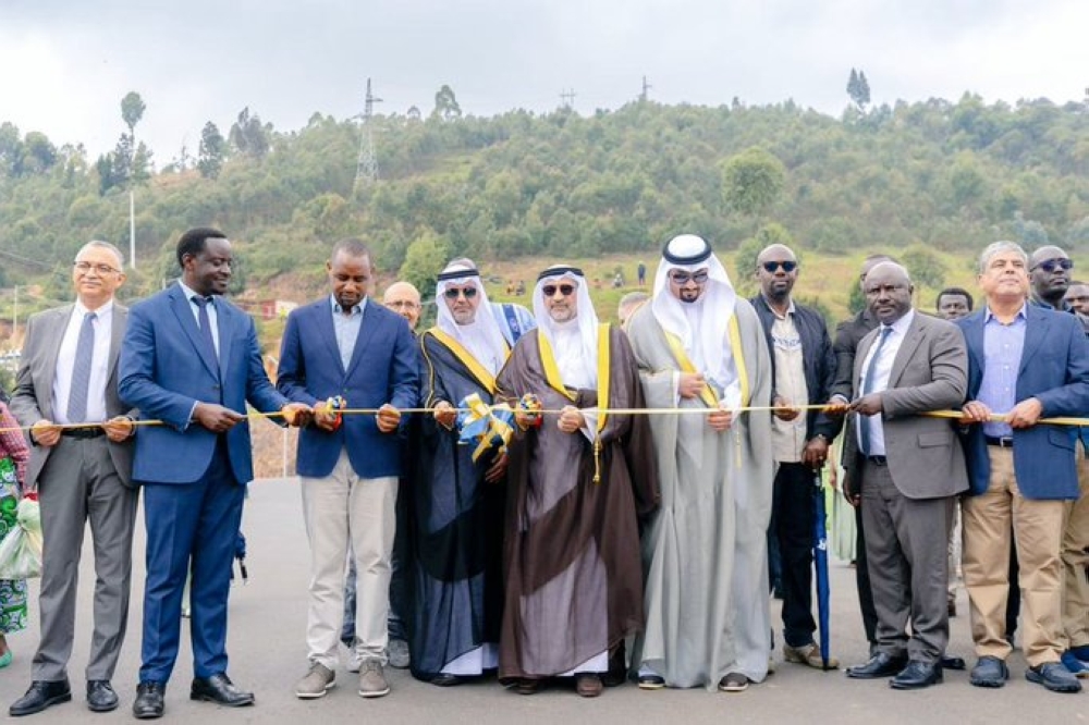 Uwihanganye (3rd from left) is joined by officials from the Arab Bank for Economic Development in Africa to cut the ribbon at the new roads&#039; launch. Courtesy.