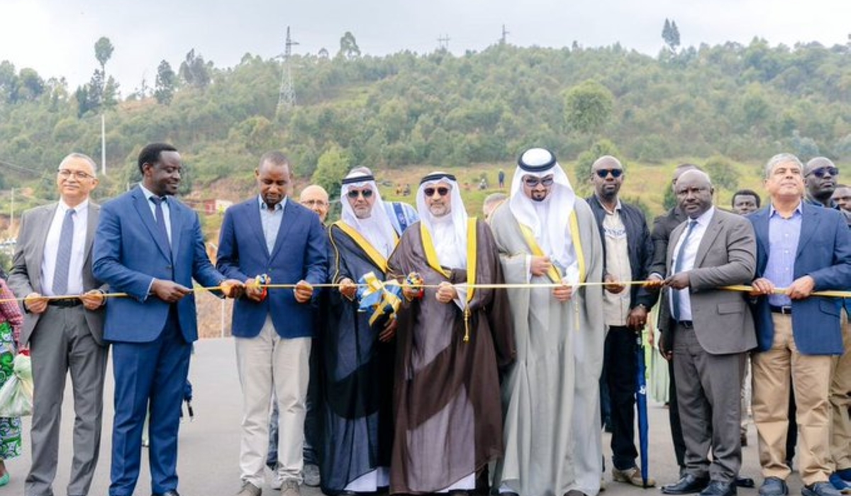 Uwihanganye (3rd from left) is joined by officials from the Arab Bank for Economic Development in Africa to cut the ribbon at the new roads&#039; launch. Courtesy.