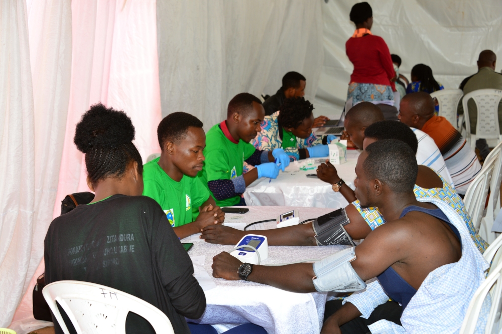 Residents undergo a mass screening exercise of Non-Communicable Diseases during  Kigali Car Free Zone. Courtesy