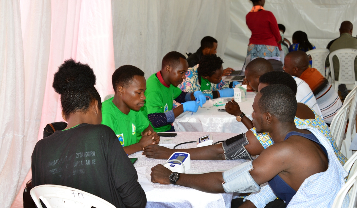 Residents undergo a mass screening exercise of Non-Communicable Diseases during  Kigali Car Free Zone. Courtesy