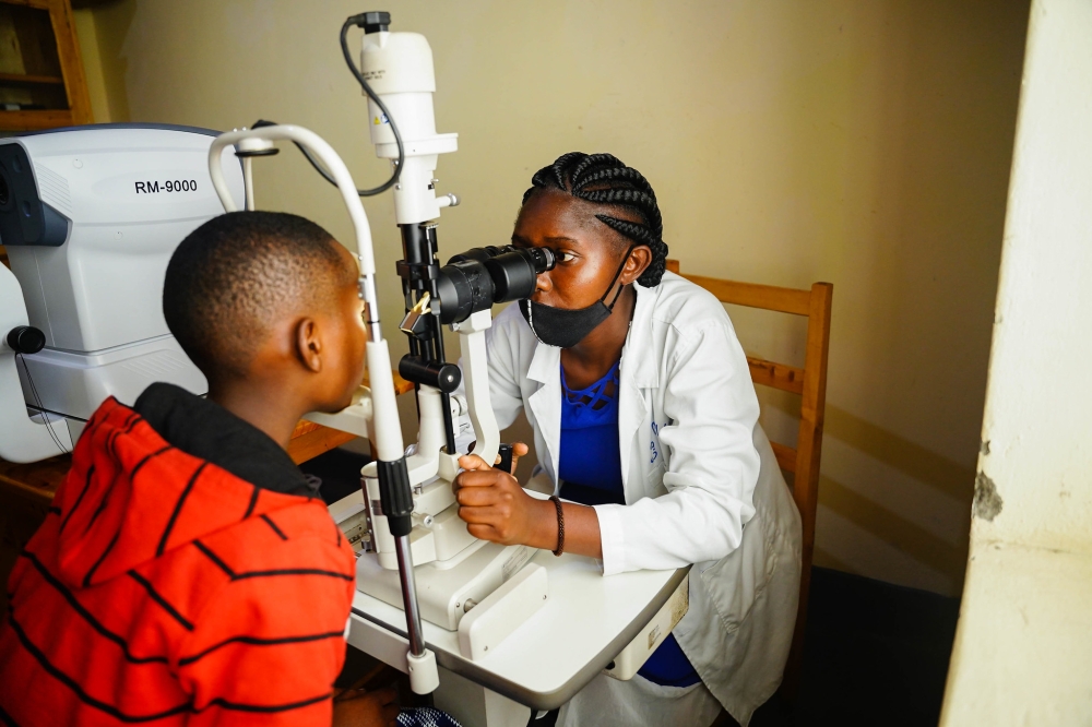 A child undergoes eye screening at Girubuzima Health Post in Burera District. Photo by Craish BAHIZI