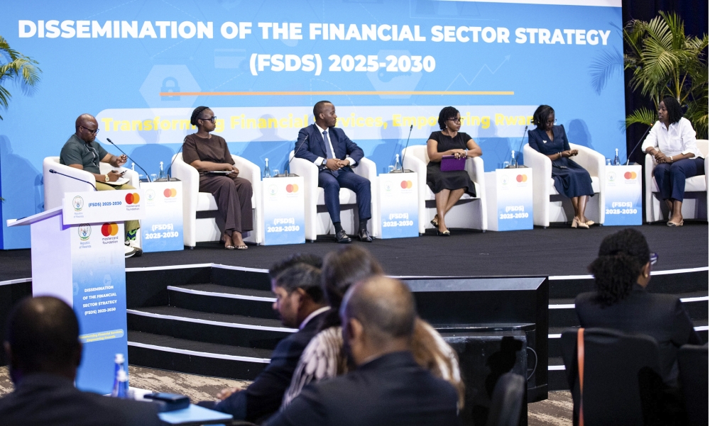 Panelists engage in a discussion during the official launch of the Financial Sector Development Strategy on Thursday, October 16. Photo by Dan Gatsinzi.