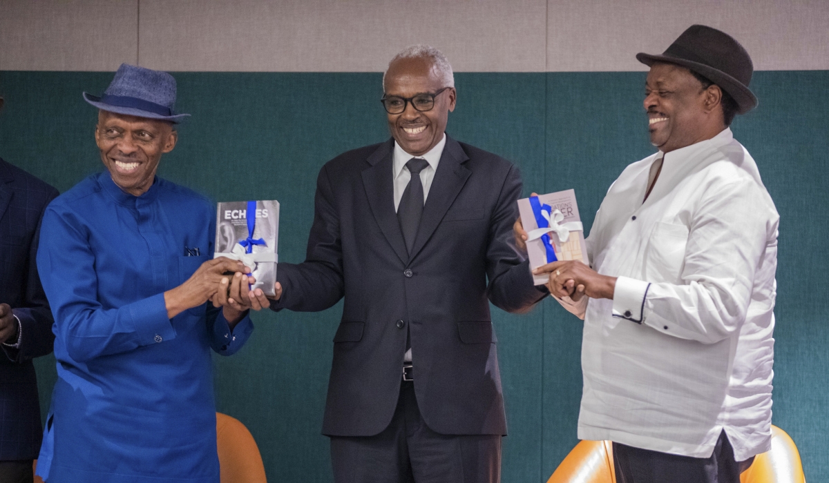 Ambassador Charles Murigande (center) attends the launch of books by ambassadors Williams Nkurunziza (R) and Gerald Zirimwabagabo (L) in Kigali on Thursday, October 16. Photo by Craish BAHIZI