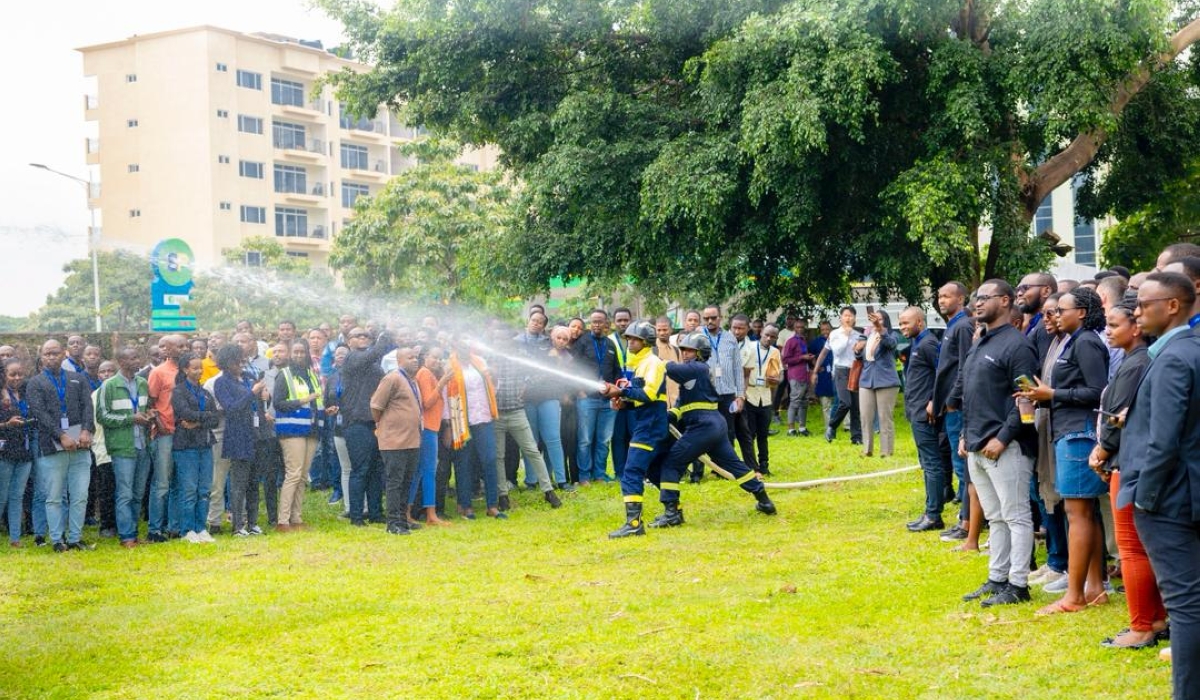 Officers demonstrate firefighting techniques during a drill aimed at practicing proper evacuation procedures and improving response coordination. Courtesy