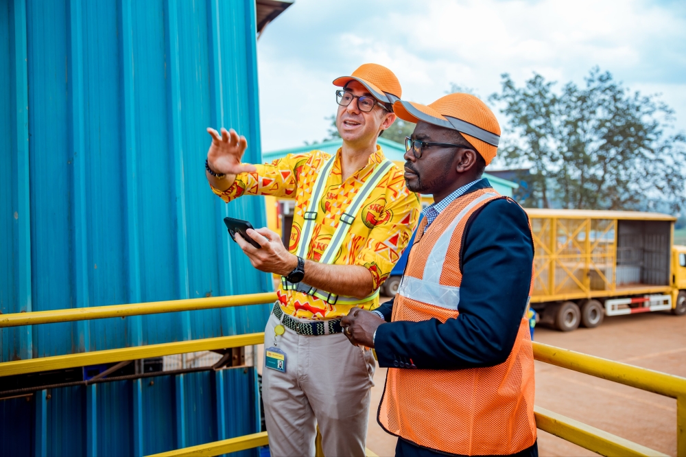 The Minister of Trade and Industry Prudence Sebahizi and Thibault Relecom, owner of SKOL Brewery during a guided tour of the firm on Friday, October 17. Courtesy