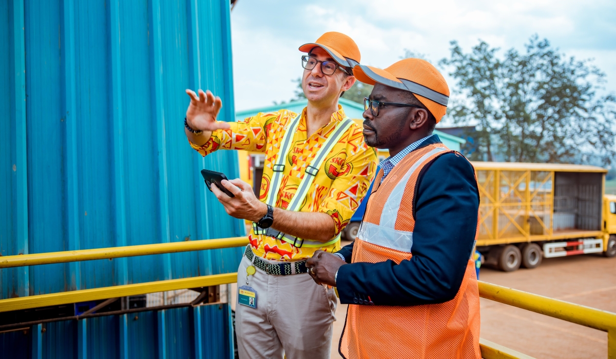 The Minister of Trade and Industry Prudence Sebahizi and Thibault Relecom, owner of SKOL Brewery during a guided tour of the firm on Friday, October 17. Courtesy