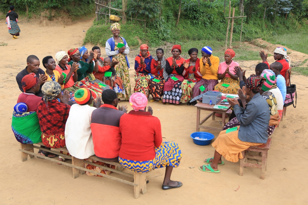 Women in Kibilizi Sector, Gisagara District, participate in a savings group session. Photo: Courtesy
