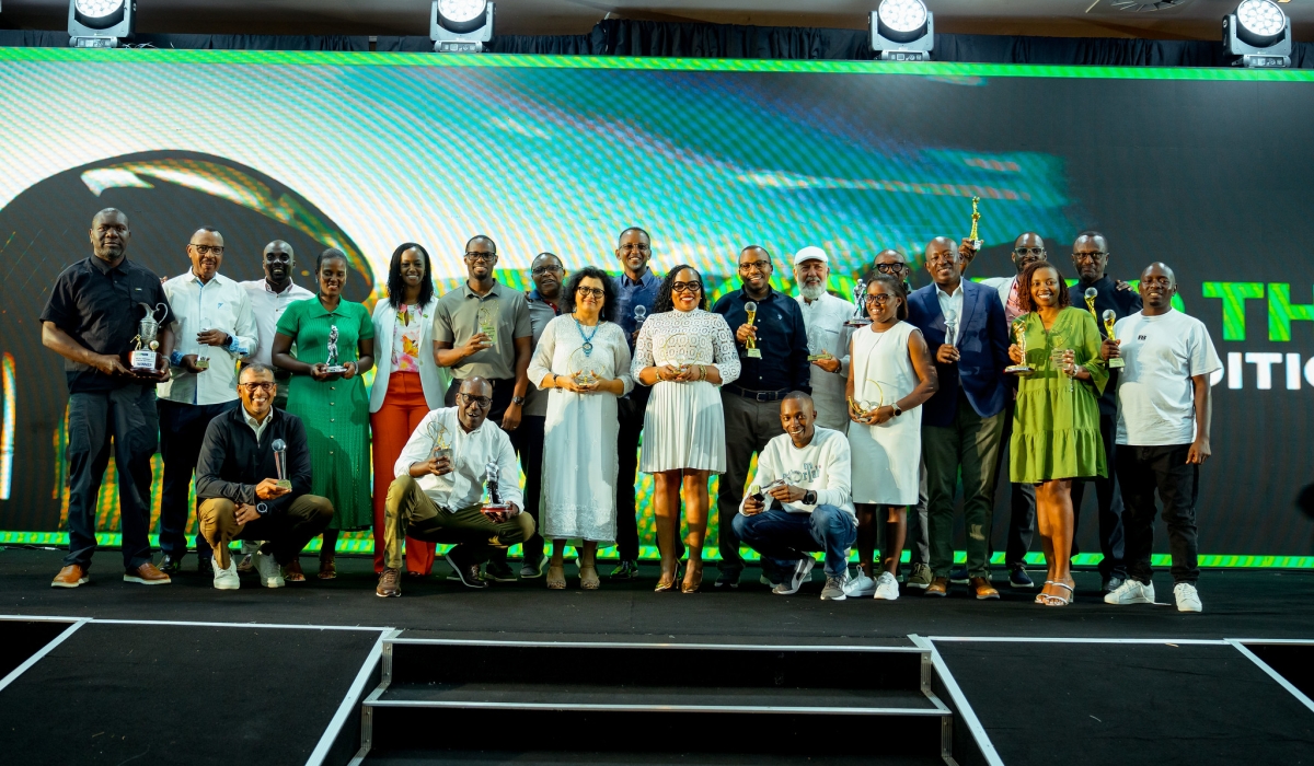 Officials and players pose for a group photo at the ceremony. Photos by Titus Manzi