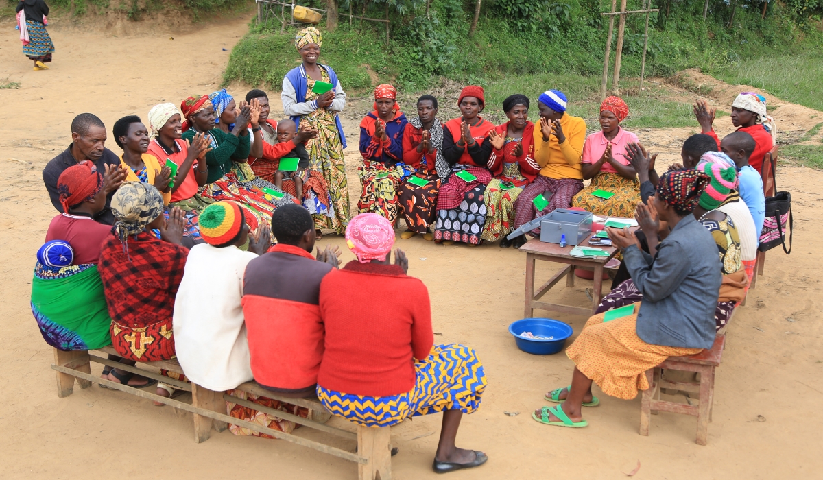 Women in Kibilizi Sector, Gisagara District, participate in a savings group session. Photo: Courtesy
