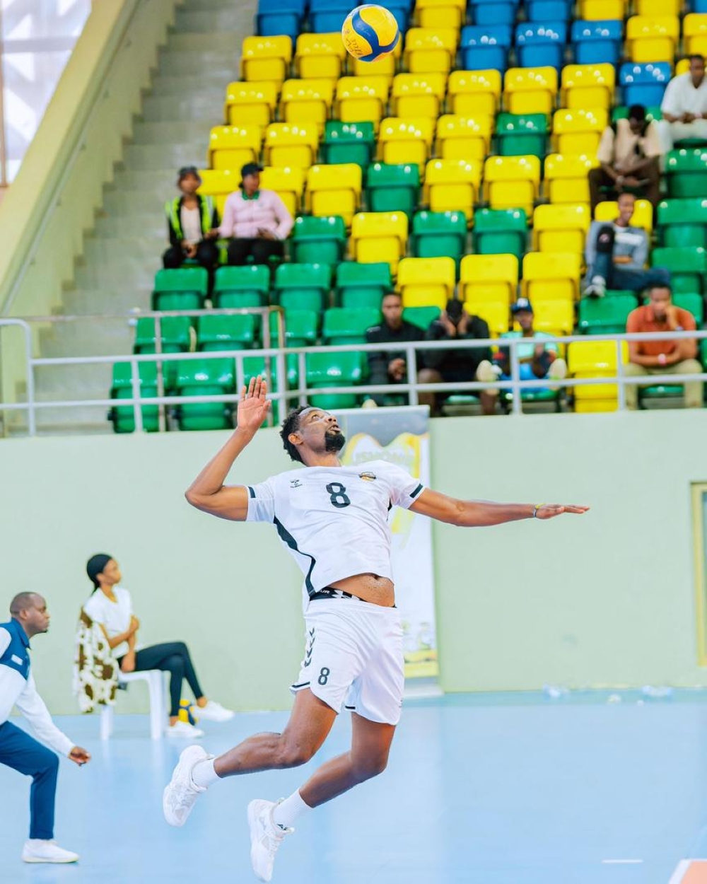 Yves Mutabazi rose into the air to serve the ball