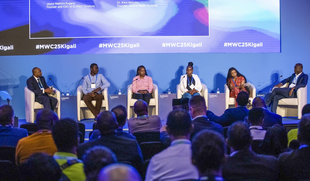 Delegates follow a panel discussion at the Summit that aimed to discuss how Africa can leverage mobile infrastructure to achieve economic gains. Dan Gatsinzi