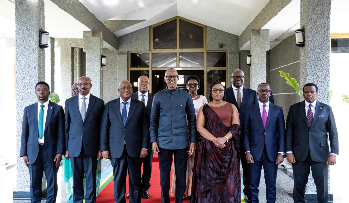 President Paul Kagame and Senior Government officials pose for a group photo with the newly sworn-in senators at the event.
