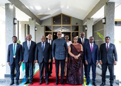 President Paul Kagame and Senior Government officials pose for a group photo with the newly sworn-in senators at the event.