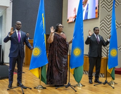 (L-R) Senators Evode Uwizeyimana, Valentine Uwamariya, and Alphonse Nkubana take the oath of office during the swearing-in ceremony held in Kigali on Friday, October 24.