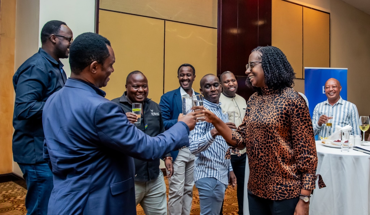 Bank of Kigali CEO Diane Karusisi  cheers with delegates as Bank of Kigali hosted a coffee exporters networking event at Kigali Serena Hotel on Friday, on  October 24. Courtesy
