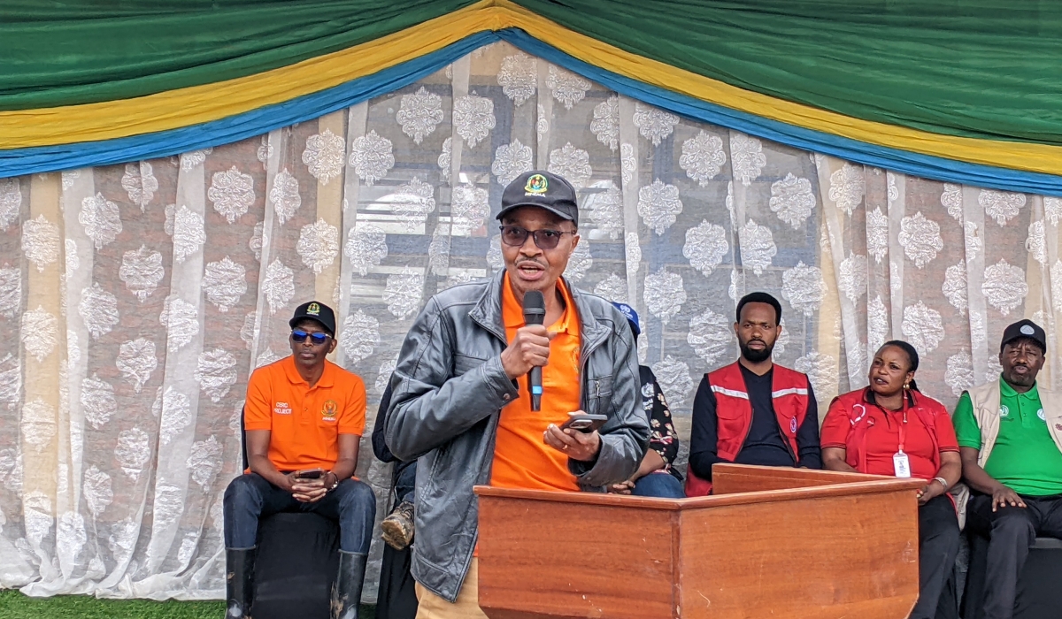 The Minister in charge of Emergency Management, Maj Gen (Rtd) Albert Murasira, joins Kivumu residents in a community work on Saturday,  October 25. Photo: Germain Nsanzimana