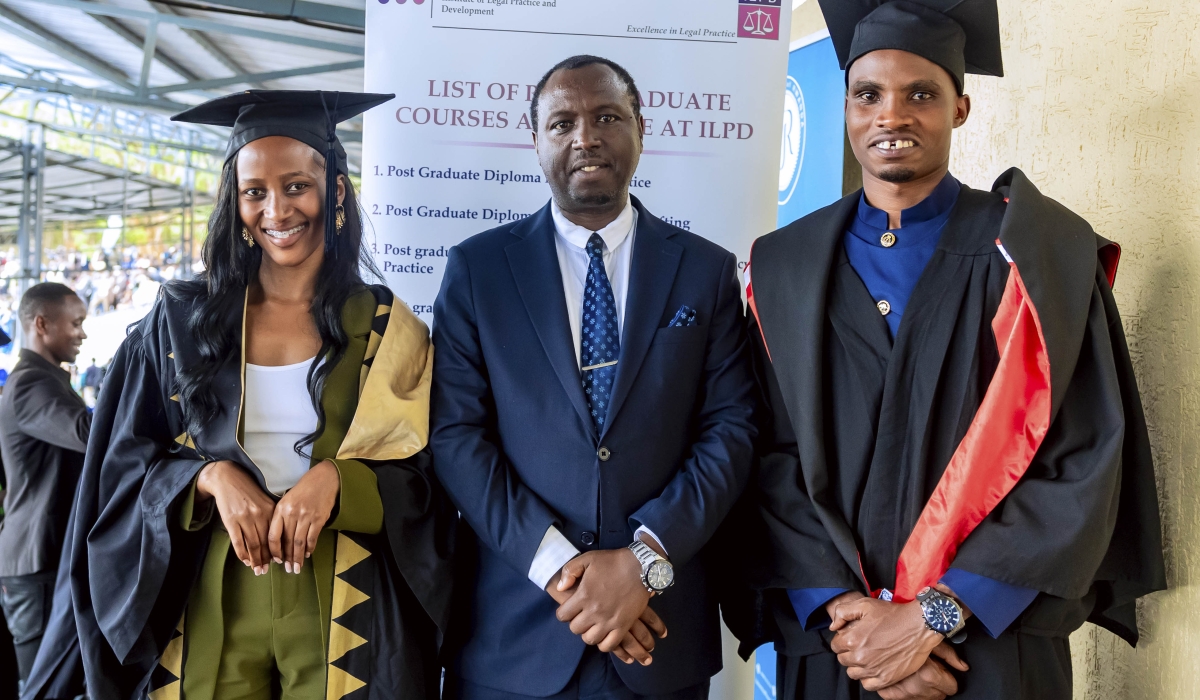 Erick Shirimpumu, Vice Rector in charge of Finance and Administration at ILPD (c) poses for a picture with Josiane Uwihirwe and Frederick Kwihangana, the top performers from University of Rwanda school of law  who received scholarships to study at ILPD. cOURTESY