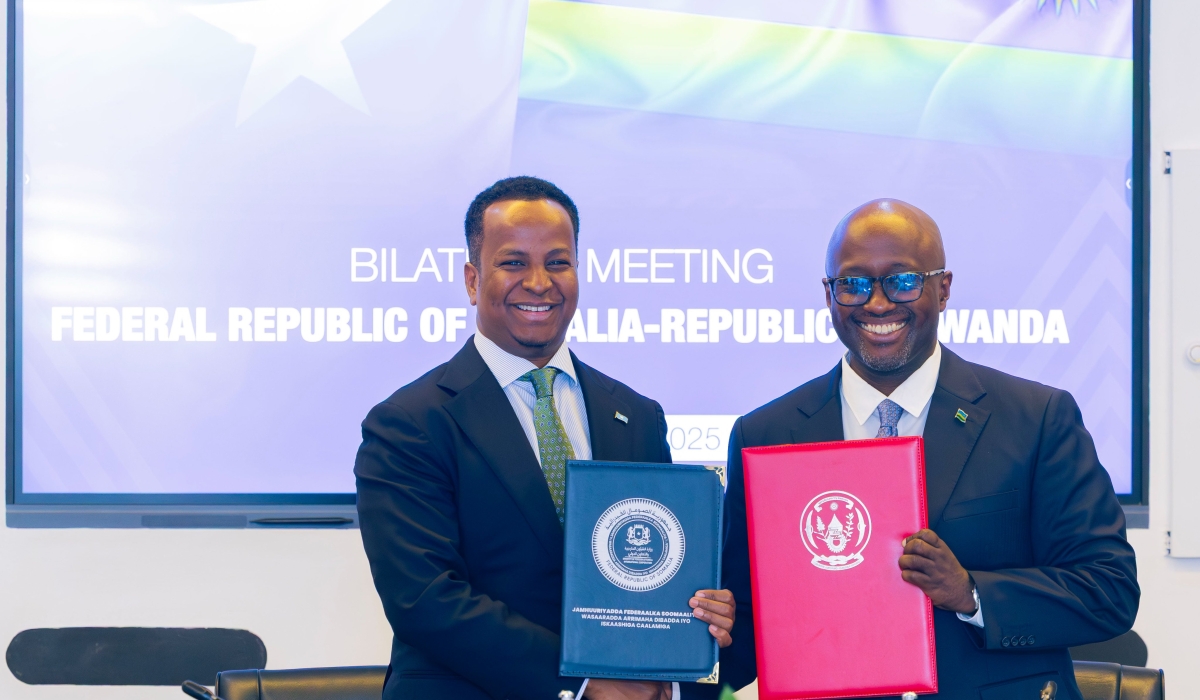 The Minister of Foreign Affairs and International Cooperation, Olivier Nduhungirehe, and his Somali counterpart, Abdisalam Abdi Ali during the signing ceremony in Kigali on Monday, October 27. Courtesy
