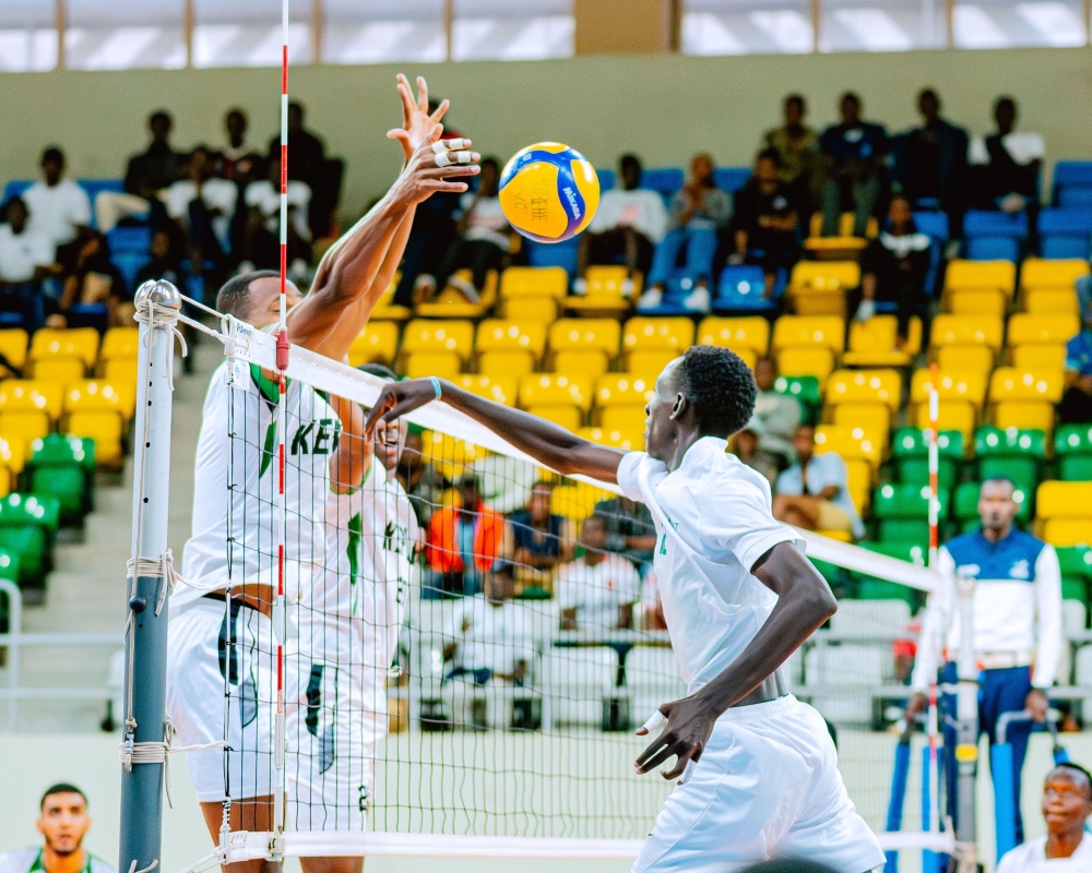 Kirehe VC’s Thierry Munyinya (right) rises for a spike during a match against Kepler VC at Petit Stade on Saturday, October 25.