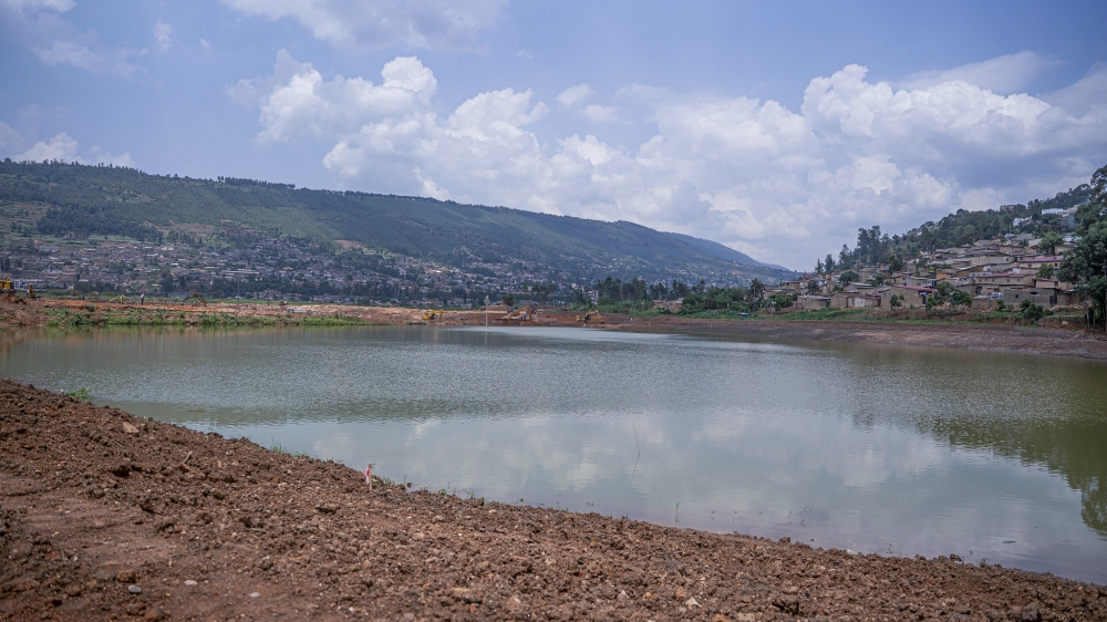 A view of the newly created lake at Nyabugogo Wetland. The new artificial lake is expected to serve as a major water retention and ecological restoration area within the city. Photo by Kellya Keza