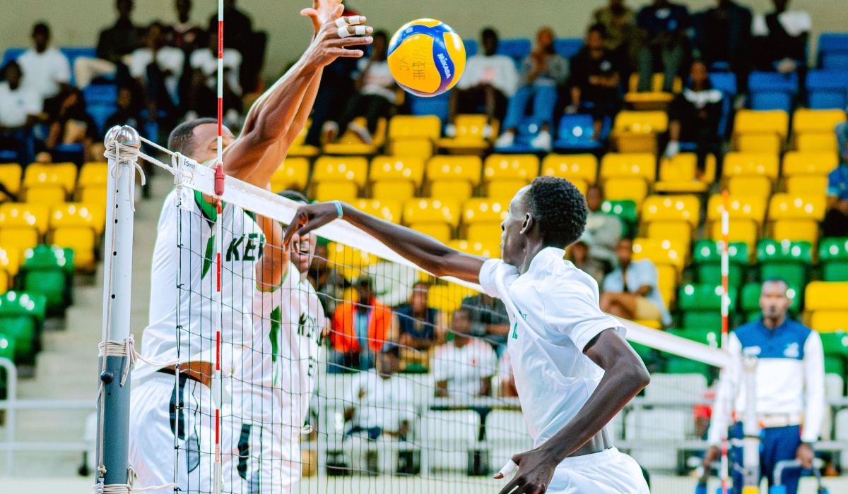 Kirehe VC’s Thierry Munyinya (right) rises for a spike during a match against Kepler VC at Petit Stade on Saturday, October 25.